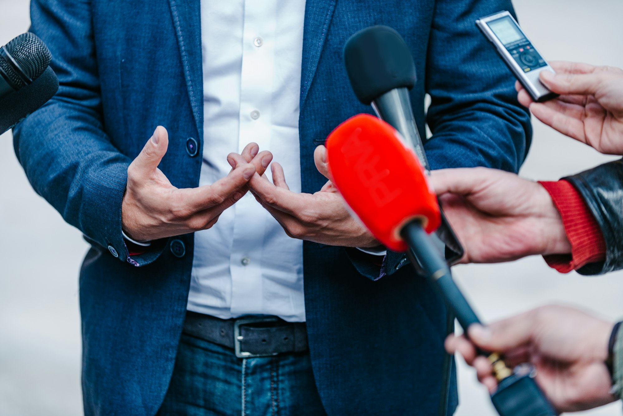 Interviewing businessman on press conference